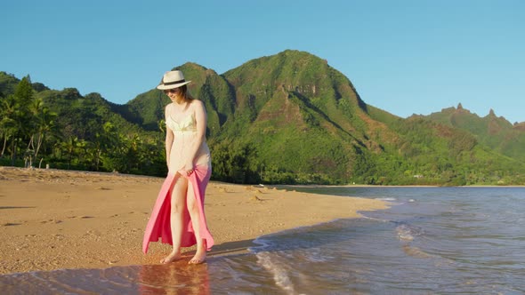 Woman in Pink Dress Walking By Beach Touristic Landmark Nature Park Destination