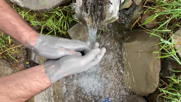 Traditional Clean Washing Hands with Grey Wood Ashes Hand washing technique Method Against Coronavir