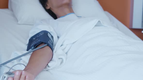 Female patient in a hospital bed