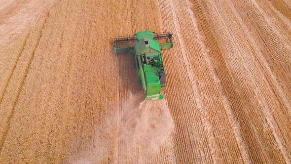  Impressive Flight Over a Working Combine Harvesting Tons of Ripe Barley