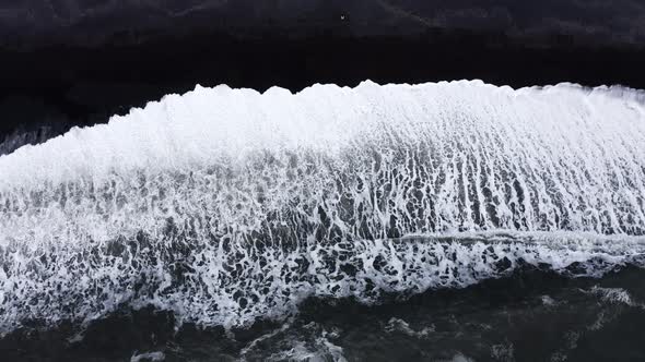 Drone View Of White Tide On Black Sand Beach