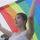 Asian Lesbian Girl Raising LGBT Rainbow Flag In The Park. - VideoHive Item for Sale