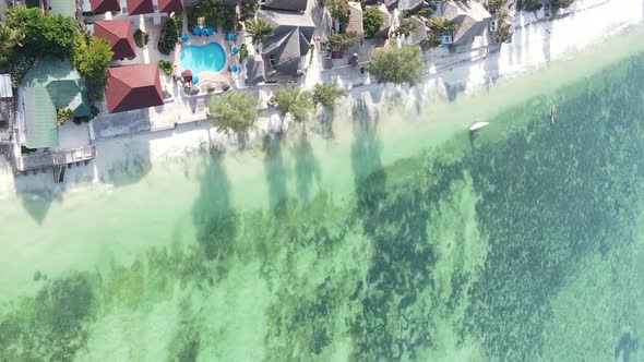 Vertical Video of the Ocean Near the Coast of Zanzibar Tanzania Aerial View