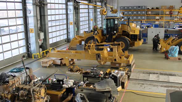 Timelapse of Reassembling and Repairing of Tractors at Plant