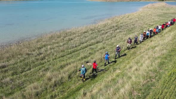 Trekking By The Lake In Aerial View 5