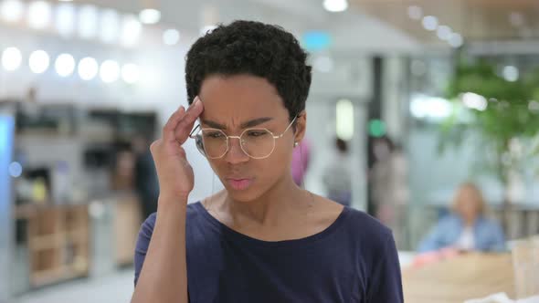 Portrait of Stressed Casual African Woman Having Headache 