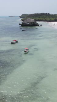 Tanzania  Vertical Video House on Stilts in the Ocean on the Coast of Zanzibar Slow Motion