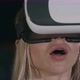 Young Woman with VR Glasses Watching Movie - VideoHive Item for Sale