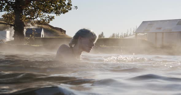 Beautiful Woman In Hot Spring Water