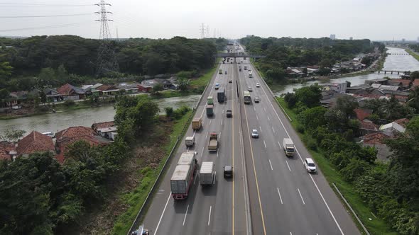 Aerial view of Indonesia Highway with busy traffic.