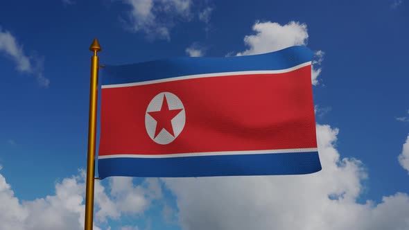 National flag of North Korea waving with flagpole and blue sky timelapse