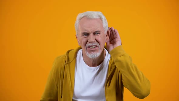 Senior Man Trying to Hear Interlocutor, Health Problems of Aged People, Deafness