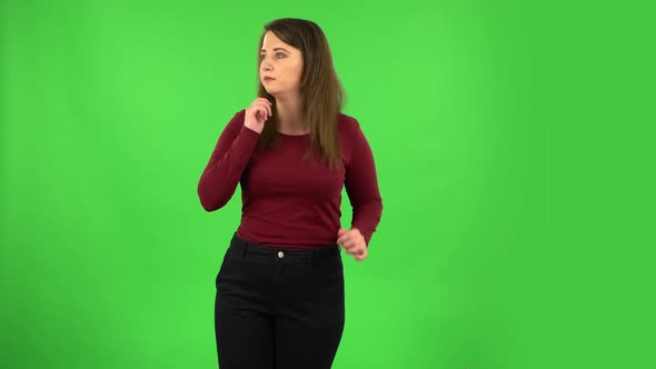 Pretty Girl Is Scared, Then Smiles and Sighs in Relief. Green Screen