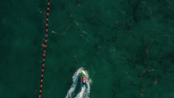 Jetskiing Along the Buoy Line