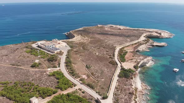 Aerial drone video from eastern Malta, Marsaxlokk area, Il-Hofra l-Kbira bay.