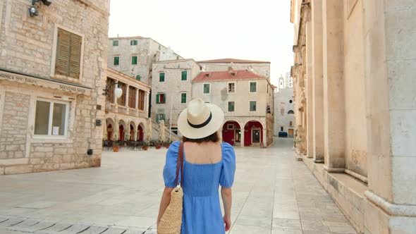 Young traveler in the old town. Video 6k