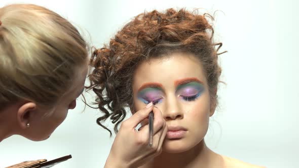 Makeup Artist Is Applying Eyeshadow.