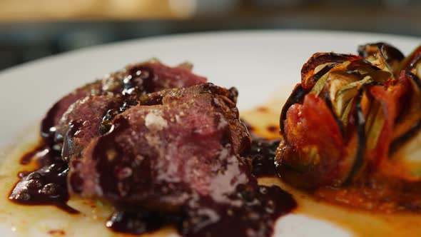 Ready dish filet mignon and ratatouille in the restaurant kitchen