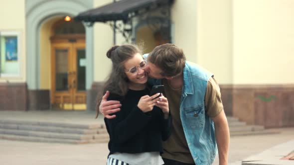 Smiling Lovely Couple Walking in the City