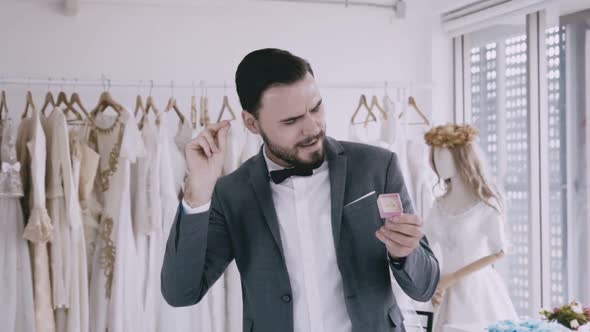 Funny Groom Man Wearing Wedding Clothes Dance in Dressing Room