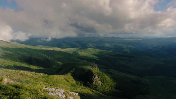 Low Clouds Over a Highland Plateau in the Rays of Sunset