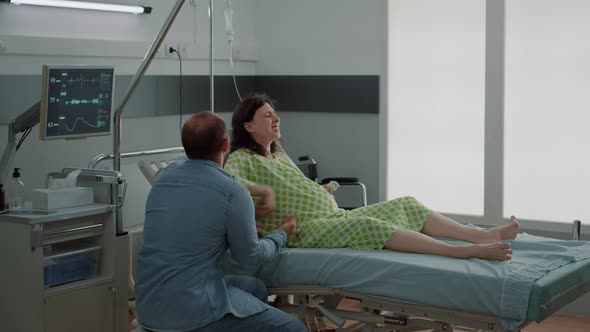 Caucasian Pregnant Woman Getting Labor Contractions