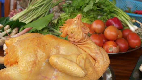 Boiled chicken and vegetables for preparation of Tom Kha Kai soup