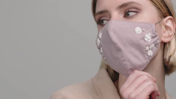 Close Up Portrait of Woman in Stylish Face Mask