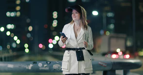 Fashion Woman in Protective Face Shield and Stylish Outfit Dancing Outside