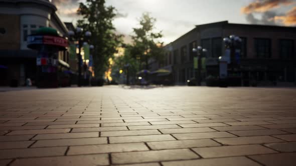 Empty Tiled Floor and Urban Skyline