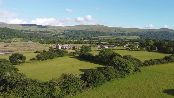 Beautiful Welsh Countryside Drone shot. Moving forward slowly towards small village