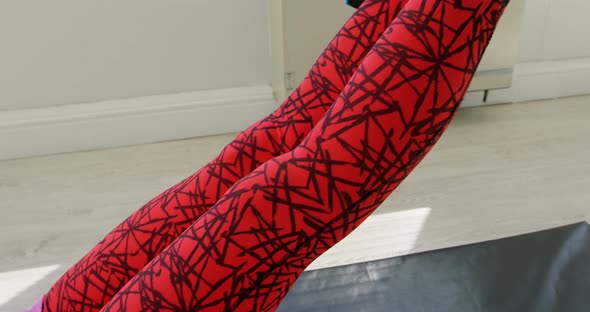 Woman meditating on hammock swing in fitness studio 4k