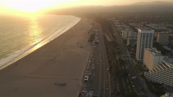 High Up View From Above Over Pacific Coast Highway PCH Next to Santa Monica Beach Ocean Waves in Los