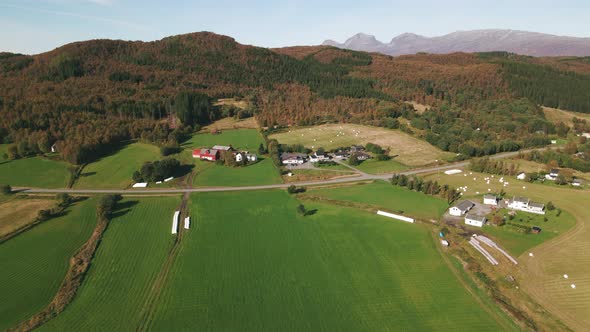 Verdant farmlands in Northern Norway, drone dolly in shot