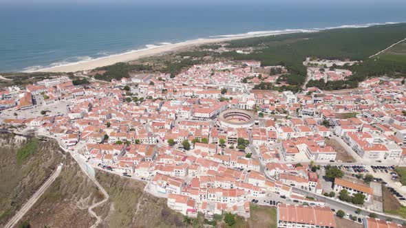 Sitio, hilltop old neighbourhood of Nazaré, Silver Coast, Portugal. Seascape and town. Aerial view