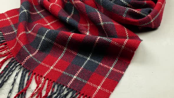 Cozy red tartan shawl with fringe. Handwoven checkered merino wool scarf