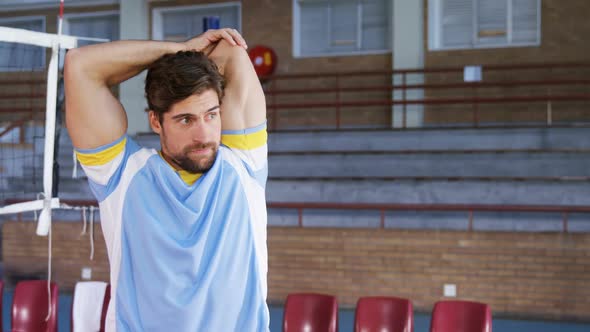 Volleyball player performing stretching exercise 4k