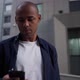 Ethnic Man Using Smartphone on Street - VideoHive Item for Sale