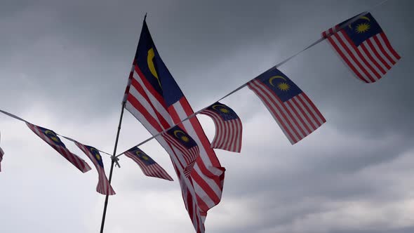 Malaysia flag is wave under raining day