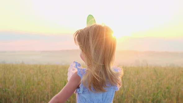 Portrait of a Little Girl in the Wheat Field.