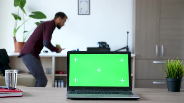 Dolly Slider Footage of Modern Laptop with Isolated Green Screen