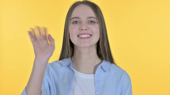 Online Video Chat By Casual Young Woman, Yellow Background