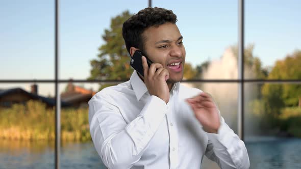 Successful Businessman Talking on Cell Phone