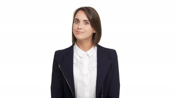 Portrait of Female Executive Manager with Beautiful Blue Eyes Wearing Business Suit Being Negative