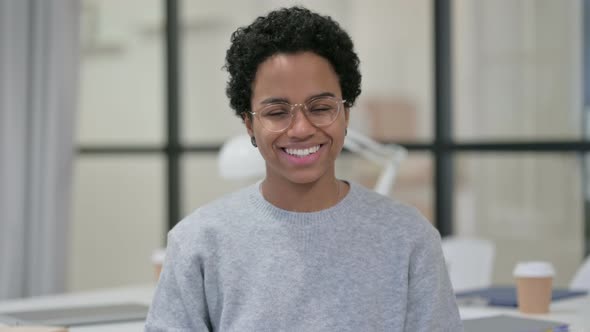 Portrait of Head Shake As Yes Gesture By African Woman 