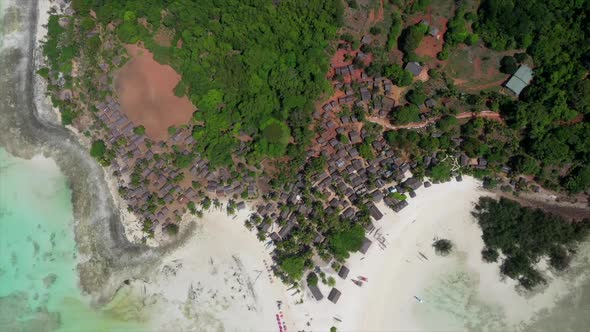 fly over shot of a small tropical island in the Indian Ocean off Madagascar