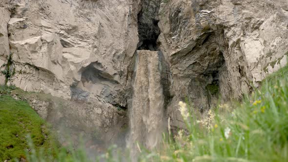 Dirty Waterfall Sultan High in the Mountains Near Elbrus in Summer