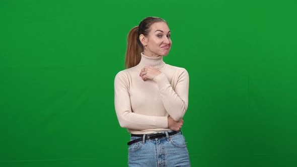 Middle Shot of Young Woman with Sarcastic Facial Expression Looking at Camera Shaking Head Yes