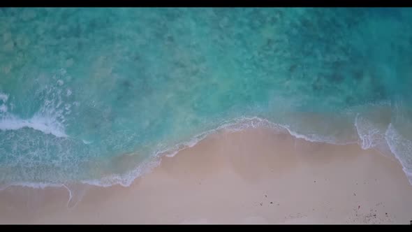 Aerial top view panorama of paradise shore beach adventure by shallow lagoon and white sand backgrou