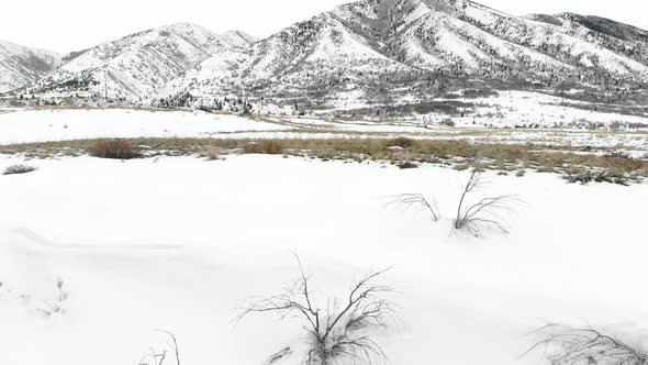 Slow hide of snow covered mountains